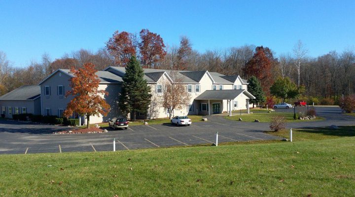 Exterior view of Brook Pointe Resort with surrounding landscape