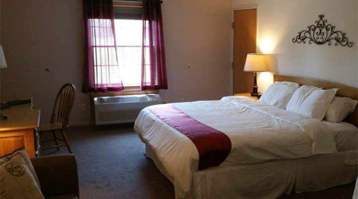 Comfortable guest room interior at Brook Pointe Resort