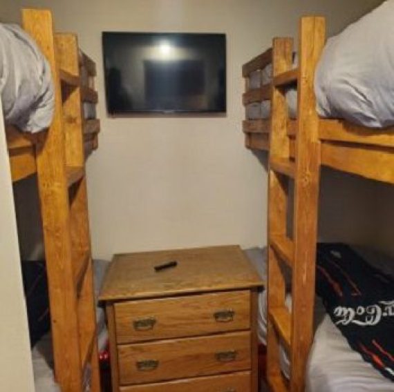 Coca‑Cola themed bunk beds in the family room at Brook Pointe Resort in Syracuse, Indiana