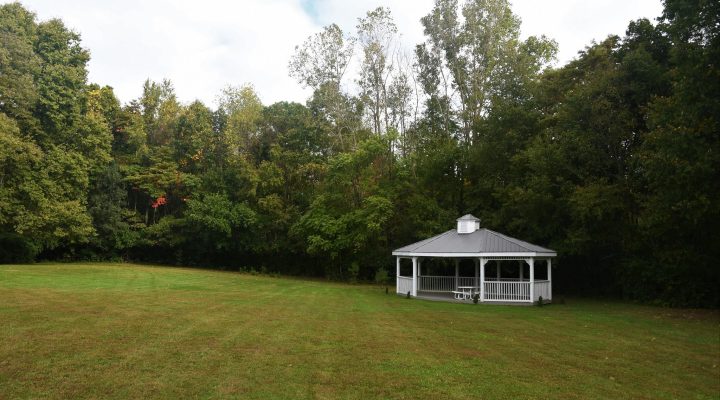 Outdoor gazebo at Brook Pointe Resort surrounded by greenery