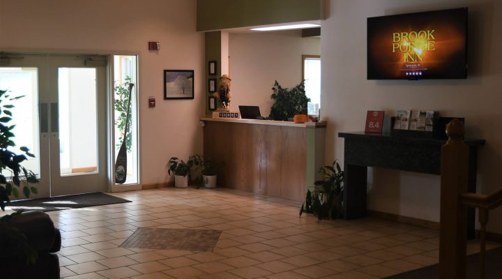 Brook Pointe Resort lobby interior with seating and décor