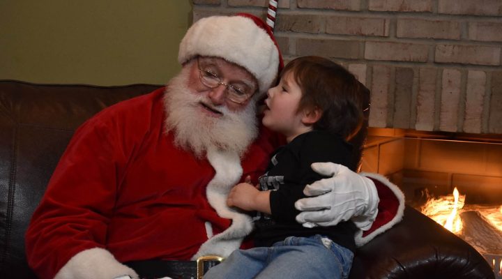 Santa Claus greeting guests at Brook Pointe Resort