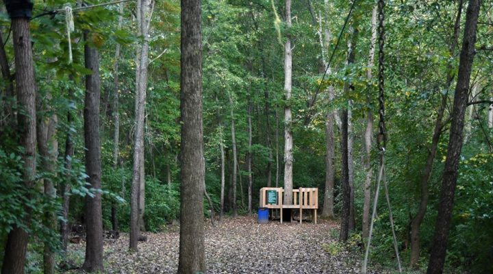 Guests enjoying the zipline adventure at Brook Pointe Resort